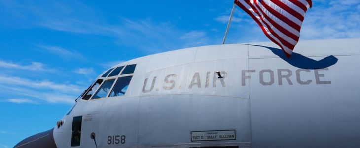 A U.S. Air Force plane and an American flag